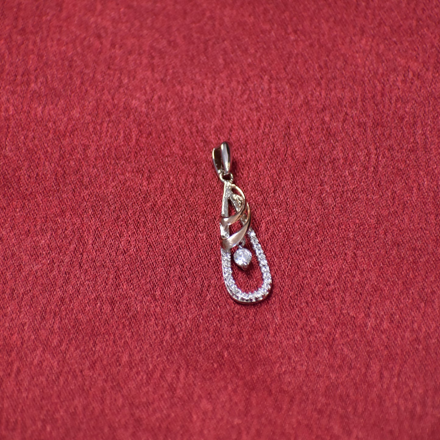 Elegant Sterling Silver Infinity Twist CZ Pendant